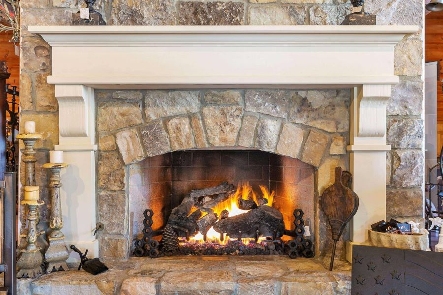 Stone fireplace with gas logs