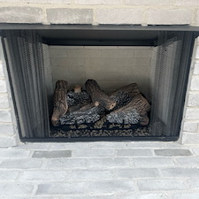 Finishing-a-Fireplace-with-Empire-Vent-Free-Sassafras-Gas-Logs 1