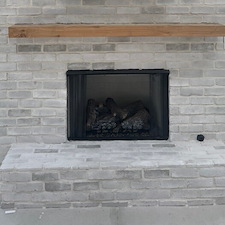 Finishing-a-Fireplace-with-Empire-Vent-Free-Sassafras-Gas-Logs 0